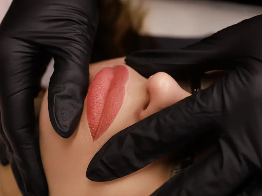 Practitioner injecting dermal filler into the lips using the Russian lips technique